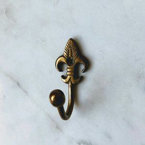 Vintage brass fleur de lis hook